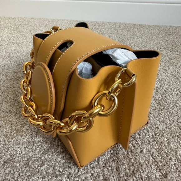 YUZEFI Daria Bucket Crossbody Bag Circular Detail in Blush Leather